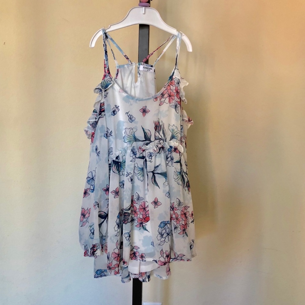 Bebe girls size 10 off shoulder top. New with tag.